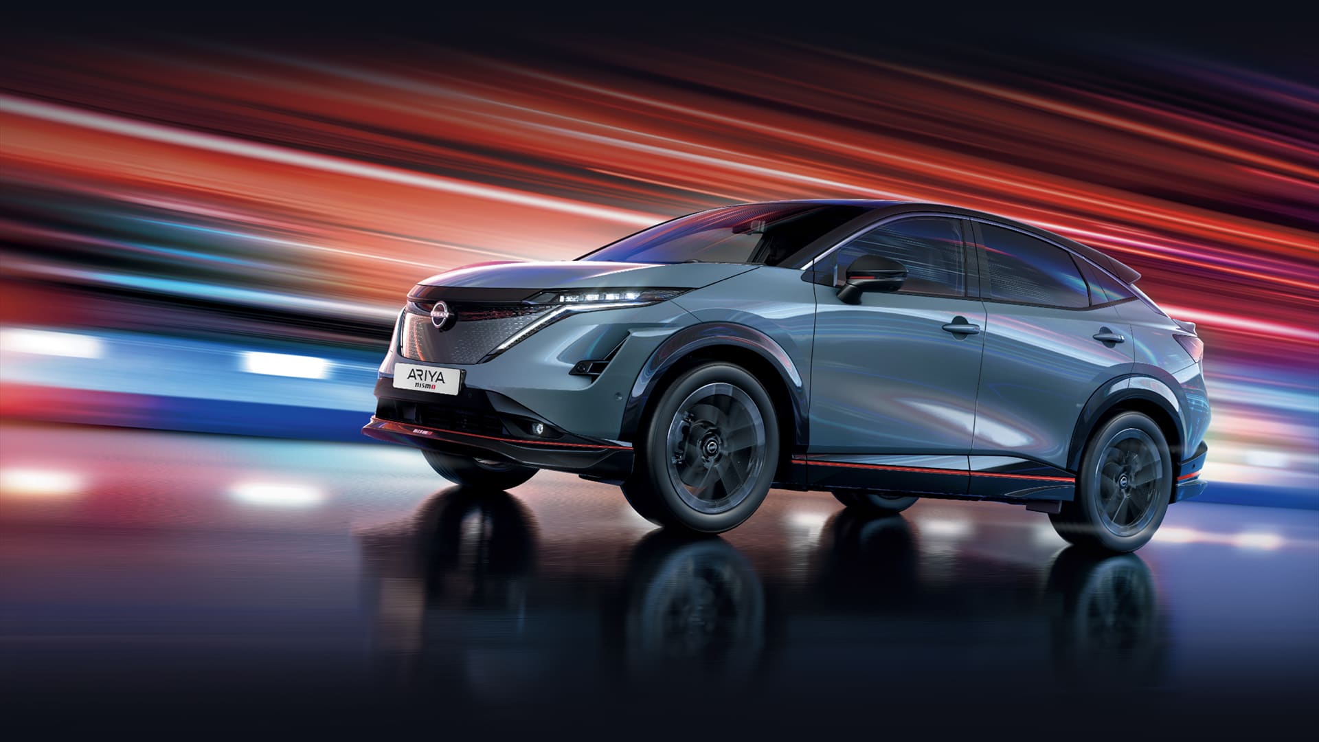 Vidéo en boucle du Nissan ARIYA NISMO sur route avec fond animé et jantes
